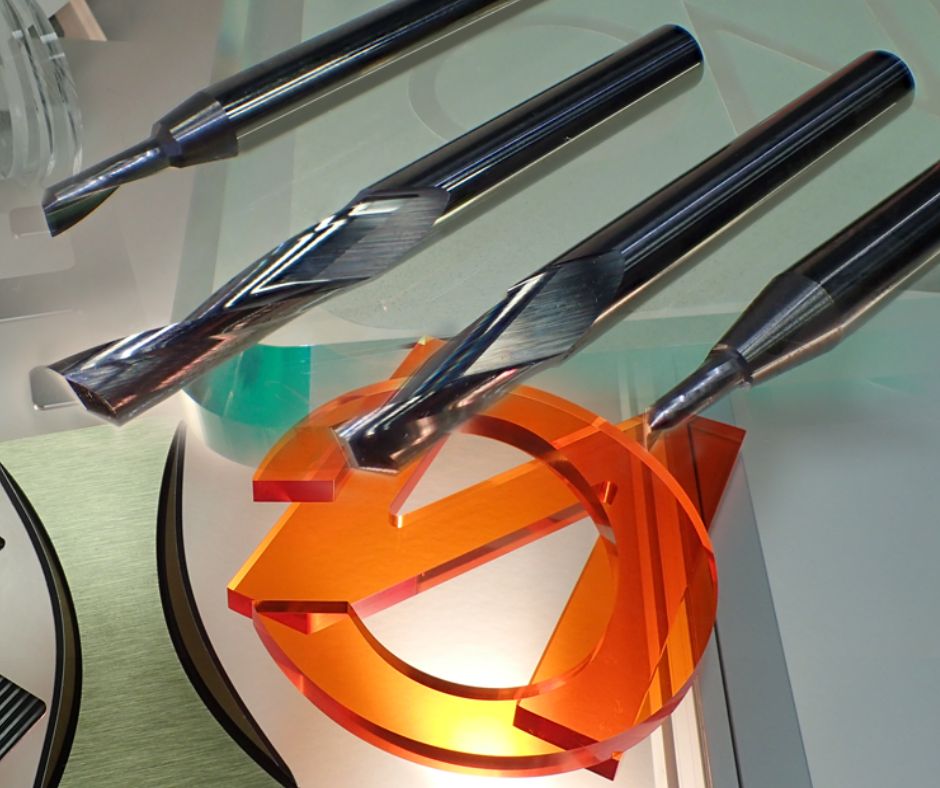 Complete CNC Solutions | CNC Tooling laid out over acrylic